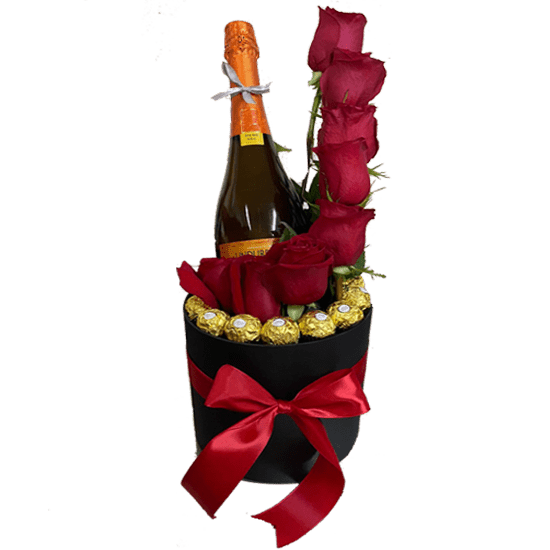 Caja clindrica con 8 rosas, bombones ferrero y espumante Caja clindrica con 8 rosas, bombones ferrero y espumante